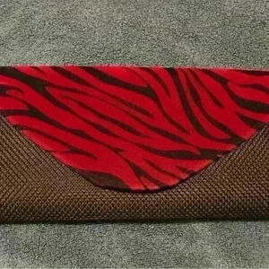 Stunning black and red clutch, hand woven zebra  print very clean condition